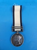 A Naval General Service medal awarded to William Moore with clasps for Algiers and Trafalgar.