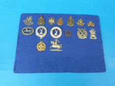 Fifteen cap badges of WW1 and WW2, Scottish and Northern Irish regiments, also includes a Scottish