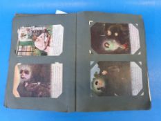 A postcard album dated 1919 containing over 170 WW1 related postcards