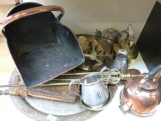A quantity of fire related equipment to include copper coal scuttle, comparison set, plated tea