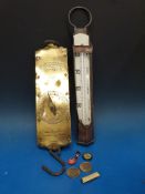A Negretti & Zambra copper 40-80 degree F thermometer together with a Chatillons milk scale and a