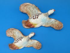 Two Beswick pink legged flying partridge wall plaques (model nos 1188-1 and 1188-3)