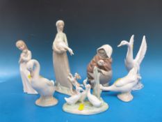 Seven Nao figures including geese, a swan,
