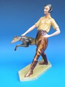 A Wade cellulose Art Deco figure of Christina restraining her greyhound,