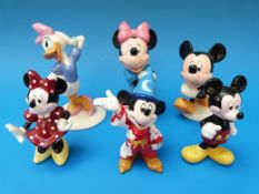 A collection of six Disney figures to include three Royal Doulton figures, Mickey Mouse MM1,