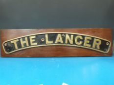 A reproduction brass steam locomotive nameplate 