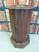 A 19thC mahogony circular pot cupboard with marble top on octagonal base (Height 72cm)