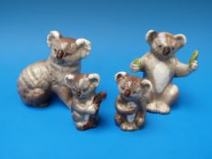 Four Beswick koalas