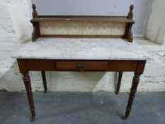 An oak marble topped single drawer washstand (W106, D51,