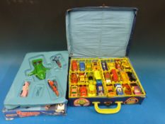 A Matchbox carry case with four complete trays of diecast model vehicles together with a Matchbox