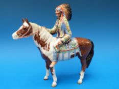 A Beswick model of a Red Indian on horseback