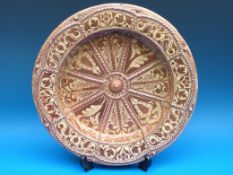 A large Arts and Crafts lustre charger in the William De Morgan style