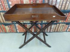 A late 19thC mahogany butler's tray and stand