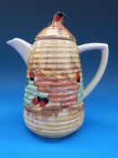 A Clarice Cliff coffee pot,