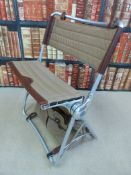 A designer aluminium Bantam folding seat with case