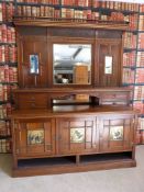 A large Aesthetic style mahogany and gilt sideboard with bevelled mirror and panelled back and two