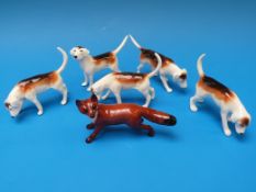 Five Beswick hounds and a black tipped fox