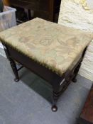 An upholstered piano stool