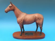 A Beswick Arkle on plinth