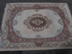 A Chinese cream rug (370 x 270cm)
