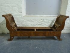 A 19thC walnut framed sofa with carved swan ends (L181, D43,