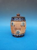 A Doulton Lambeth tobacco jar with floral decoration,