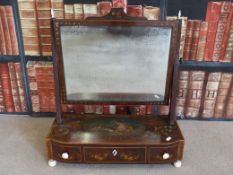 A 19thC swivel dressing table mirror with central decoration of a classical scene with flowers and