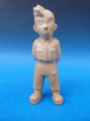 Bovey Pottery 'Our Gang' figure of a young soldier with hands behind his back.