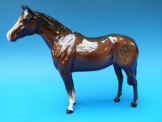 A Beswick thoroughbred horse with tail loose