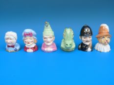 A Royal Worcester Connoisseur Collection of six candle snuffers from Punch and Judy