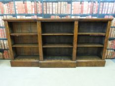 A Victorian burr walnut breakfront bookcase with adjustable shelves (W241cm x D36cm x H120cm)