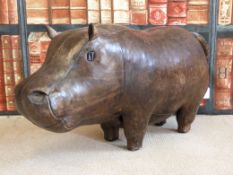 A leather Liberty style hippopotamus footstool (Length 70cm)