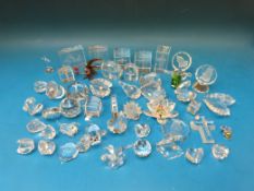 A collection of glass ornaments including Swarovski style