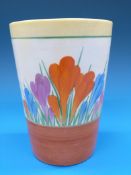 A Clarice Cliff lemonade beaker decorated in the 