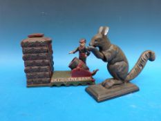 A cast metal Artillery Bank money box and a squirrel nutcracker