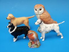 Three small Beswick dogs, a Dalmatian,