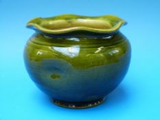 A green glazed bowl by Slaymaker & Co, Covent Garden (14cm diameter,