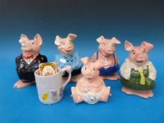 A set of Wat Nat West pig money boxes,
