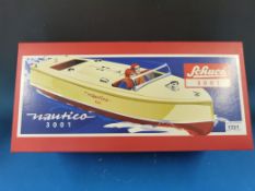 A Schuco model boat 'Nautico 3001' in original box and clockwork motor