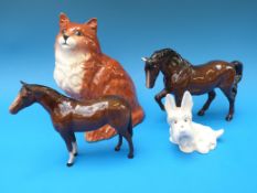 Two Beswick horses in brown gloss finish, together with a Beswick cat model number 1867,
