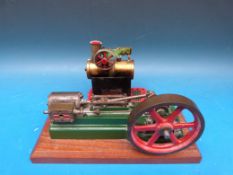 A Stuart Turner S50mill engine finished in green and red,