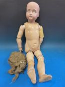 A Simon and Halbig bisque headed doll with open mouth,