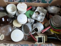 A collection of 1940s dolls house furniture and toy kitchenware together with glass bottles and