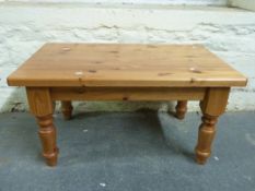 A pine coffee table (L91, W55,