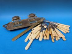 An Art Nouveau twin inkwell,