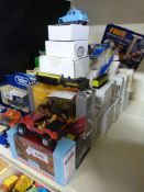A collection of Lledo and other diecast model vehicles together with an N gauge train and carriages,