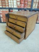 A small apprentice Wellington chest comprising five drawers (W31, D34,