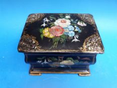 A lacquer bombe-shaped tea caddy with hand-painted floral scene inlaid pearl and gilt decoration