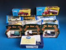 Twelve Corgi and Corgi Classics diecast model, cars, buses,