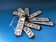 A quantity of cast signs including Private, Ladies, Gents,